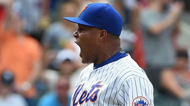 New York Mets relief pitcher Jeurys Familia reacts after he...