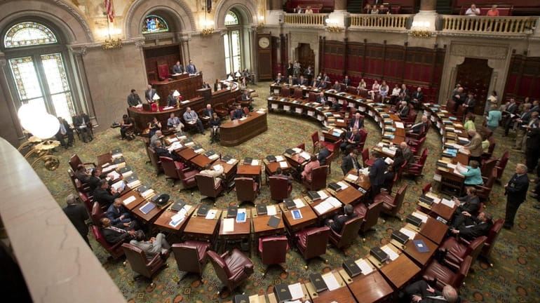The New York State Senate meets in session at the...