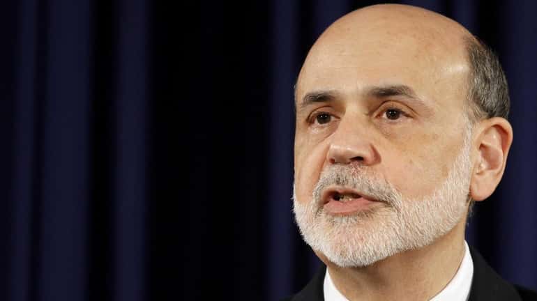 Federal Reserve Board Chairman Ben Bernanke speaks during a news...