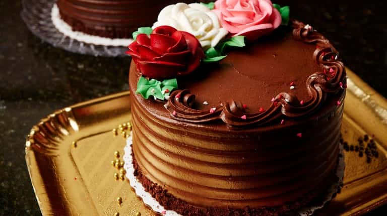 The chocolate fudge flower cake at Buttercooky Bakery in Manhasset features layers of...