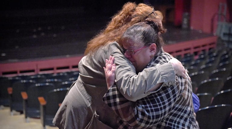 Jeanne D'Esposito, right, is comforted by Laura Young after BOCES...