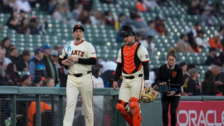 San Francisco Giants pitcher Blake Snell, left, and catcher Patrick...