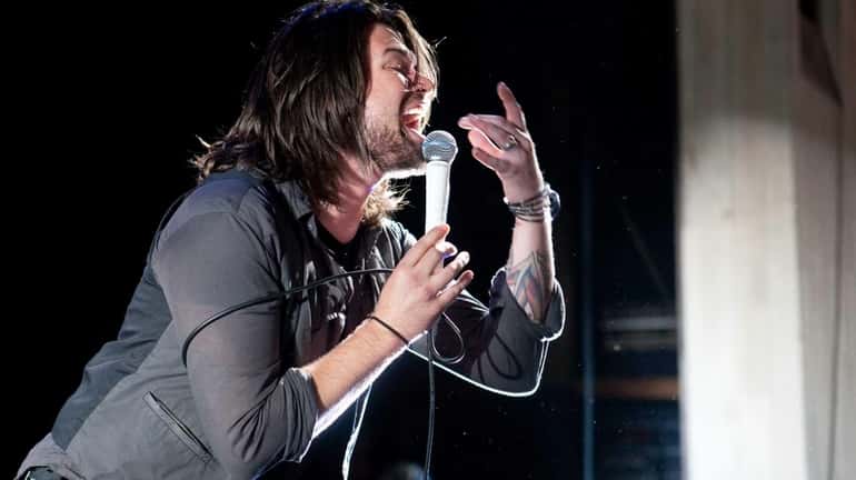 Lead singer Adam Lazzara of Taking Back Sunday performs at...