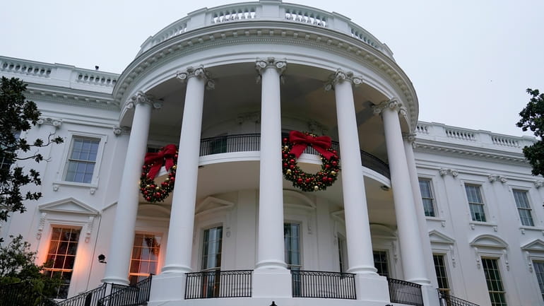 Wreaths hang on the Truman Balcony of the White House...