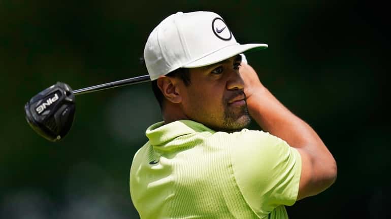 Tony Finau drives off the second tee during the final...