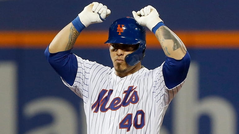 Wilson Ramos of the Mets reacts at second base after...