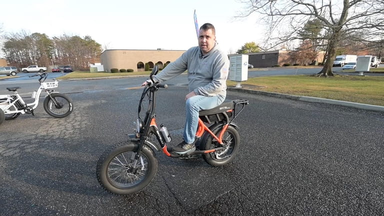 Michael Stack, owner of E Bikes of Long island in Ronkonkoma,...