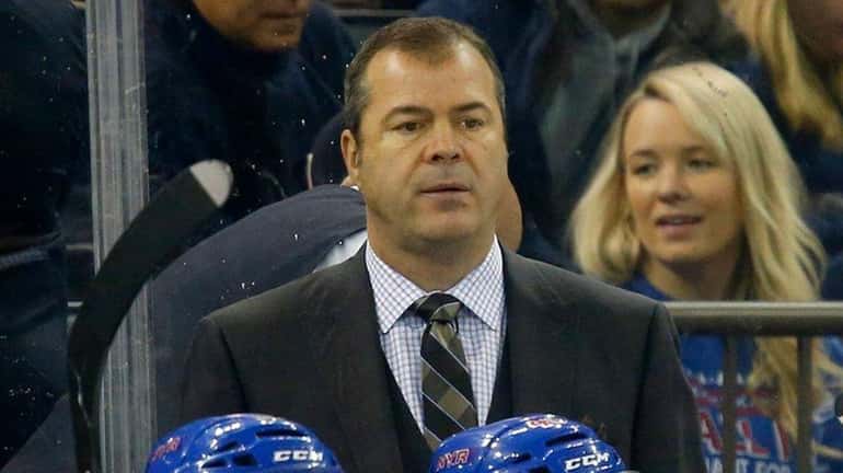 Rangers head coach Alain Vigneault looks on during the first...