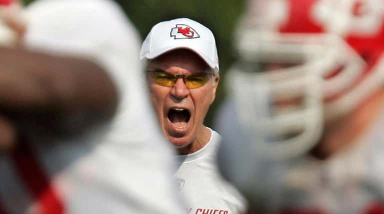 Kansas City Chiefs defensive coordinator Gunther Cunningham yells out orders...