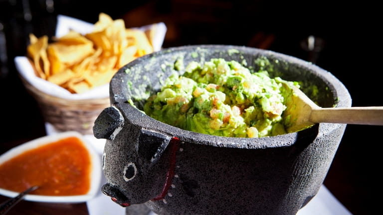 Tableside guacamole is served at Besito in Huntington.
