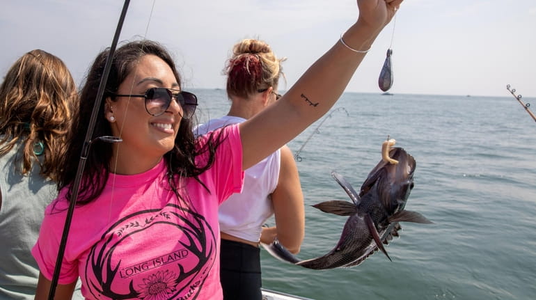 A black bass is caught by Arianna Castagna of Port...