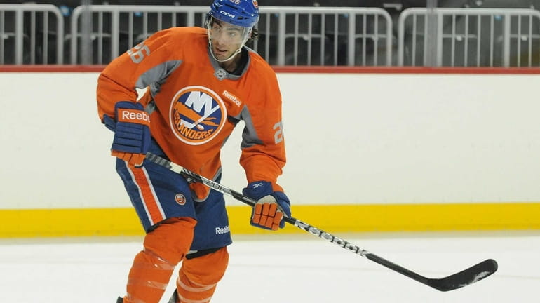 Islanders left wing Matt Moulson skates during the team's first...