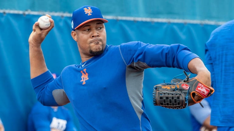 Mets pitcher Jeurys Familia throws during a spring training workout...