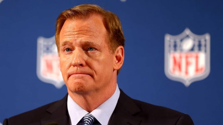 NFL commissioner Roger Goodell talks during a press conference at...