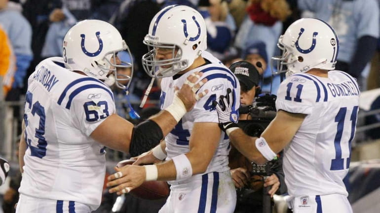 Indianapolis Colts tight end Dallas Clark (44) is congratulated by...