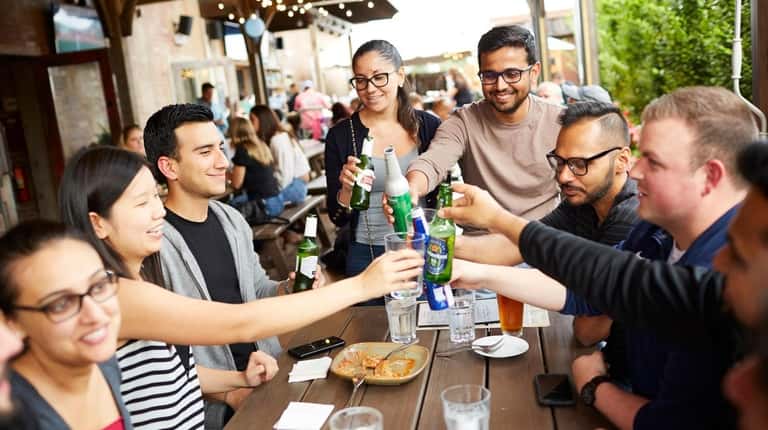 Guests enjoy bites and drinks at Garden Social in East Meadow. 