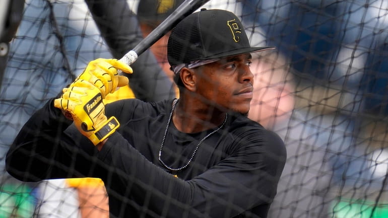 Pittsburgh Pirates' Ke'Bryan Hayes takes batting practice before a baseball...