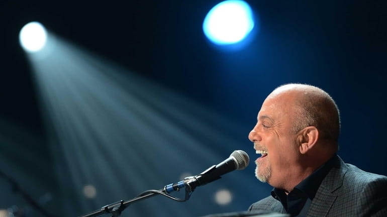 Billy Joel performs at the 12-12-12 concert benefiting The Robin...