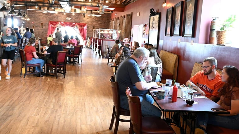 Patrons dine at Toast Coffeehouse in Patchogue on Saturday.