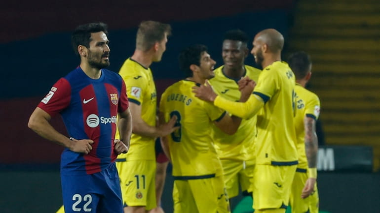 Villarreal players celebrate after Villarreal's Jose Luis Morales scoring his...