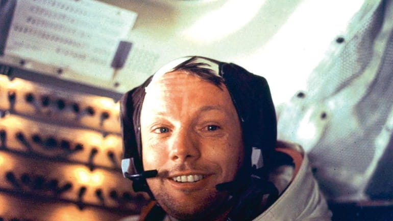 U.S. astronaut Neil Armstrong is seen smiling at the camera...