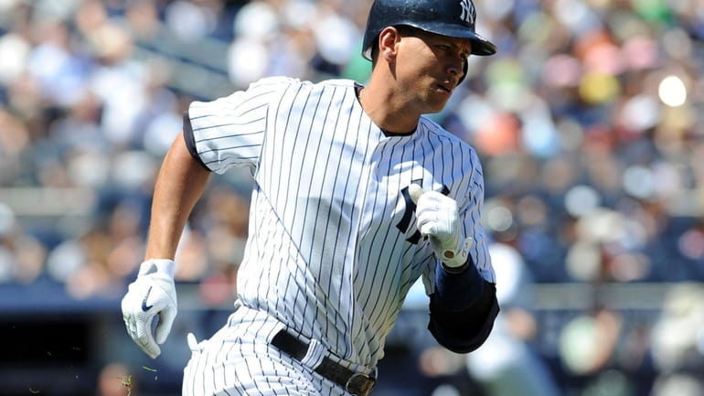 New York Yankees' Alex Rodriguez runs the bases in the...