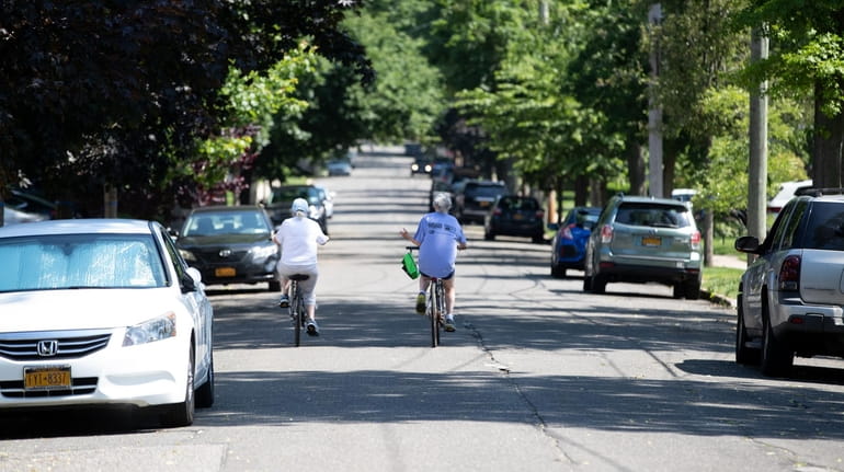 Bicycling down Bellmore Avenue in Floral Park