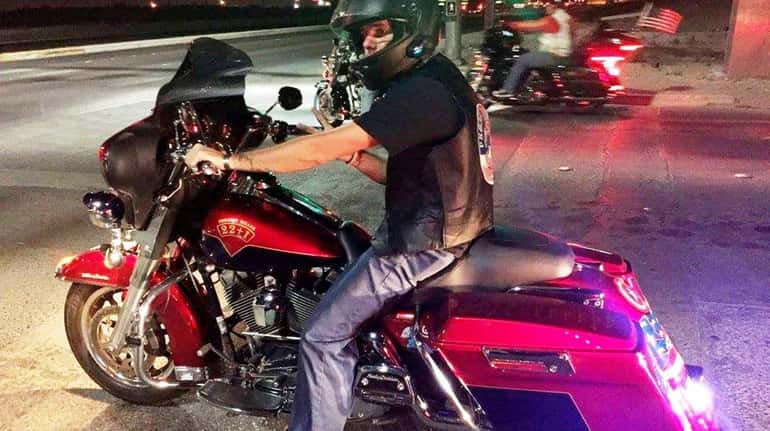 JR Matzner, 34, of Yuma, Arizona, is riding a motorcycle...