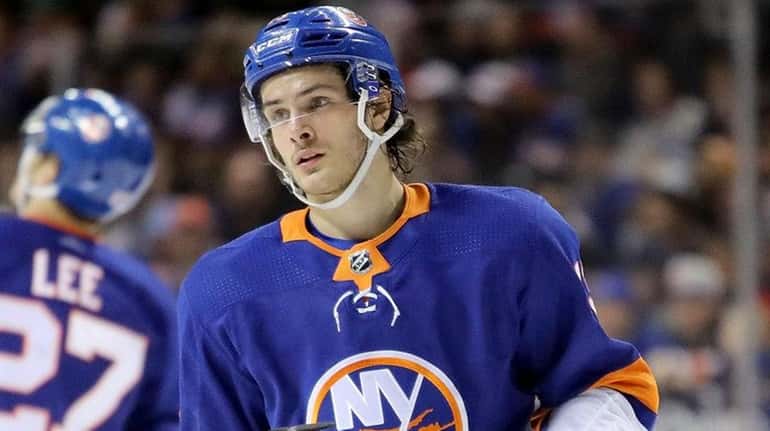 Mathew Barzal #13 of the New York Islanders reacts in...