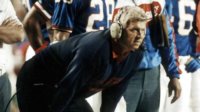 Head coach Bill Parcells of the New York Giants watches...