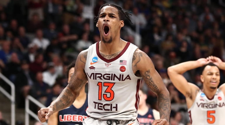 Ahmed Hill #13 of the Virginia Tech Hokies reacts in...