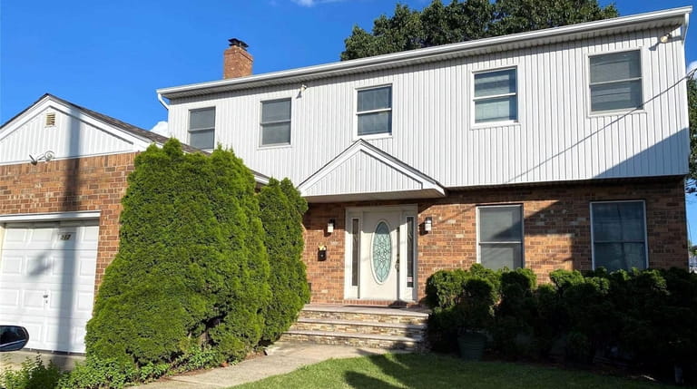 Priced at $979,000 and located on West Broadway in Cedarhurst,...