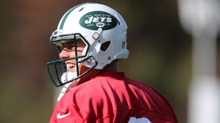 New York Jets quarterback Bryce Petty smiles during a practice...