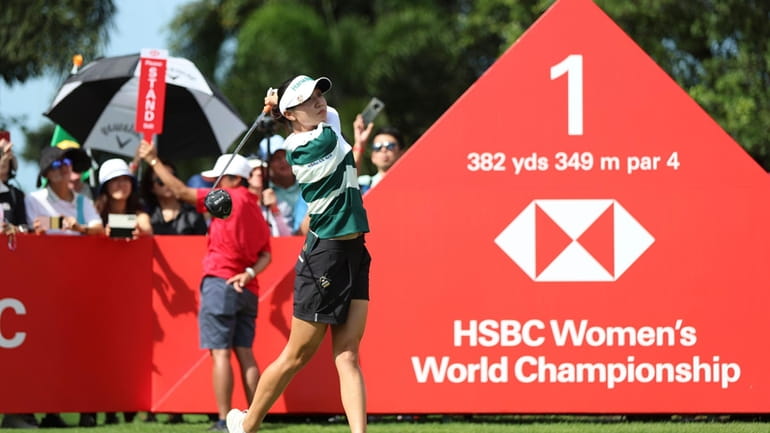 Lydia Ko of New Zealand is plays her first tee...