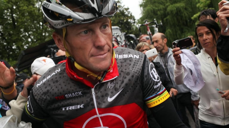 Lance Armstrong with team RadioShack heads to the start of...