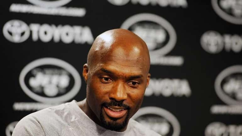 Derrick Mason of the New York Jets speaks to the...