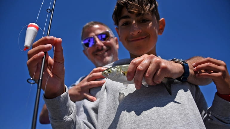 Jake Polito, 13, of East Patchogue, and his dad, Chris...