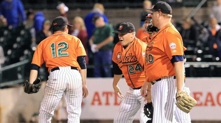 The Long Island Ducks celebrate after their 5-1 victory over...