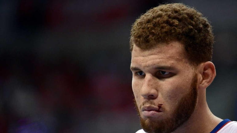 Blake Griffin of the Los Angeles Clippers looks on in...
