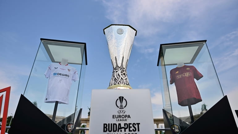 The UEFA Europa League Trophy is displayed in the Fan...