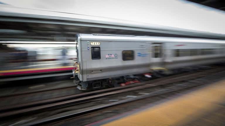 An eastbound Long Island Rail Road train enters Jamaica station on...