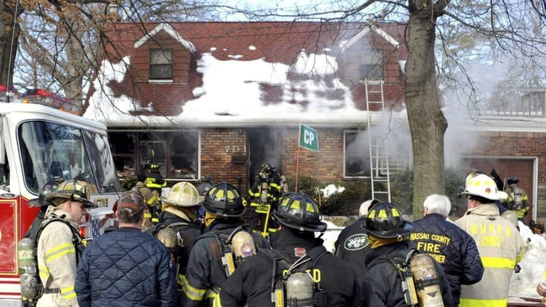 Several firefighters were injured in a house fire in New...