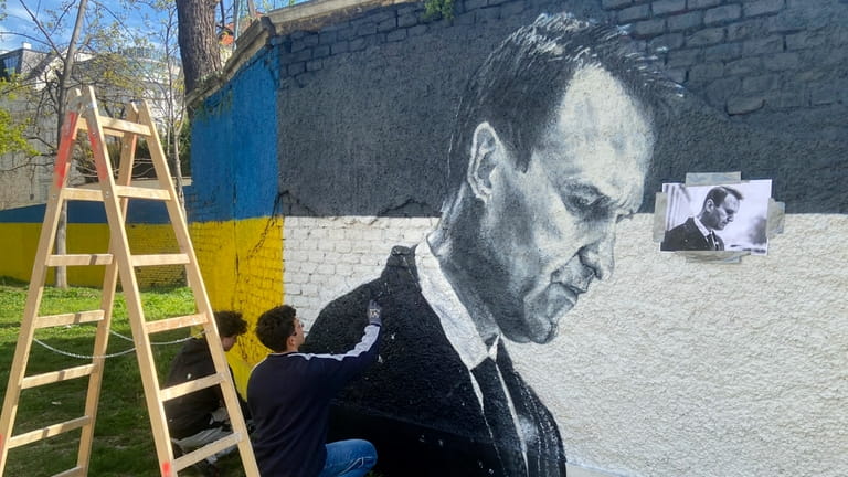 Austrian graffiti duo Joel Gamnou paint a picture of Alexei...