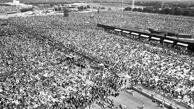 Overview of crowd at "Summersault '74", a rock festival held...