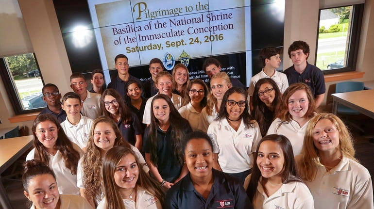 Thirty-five students from St. John the Baptist High School are...