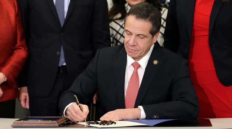 New York Gov. Andrew M. Cuomo signs the Child Victims...