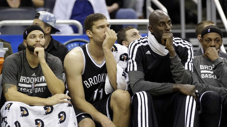 From left, Deron Williams, Brook Lopez, Kevin Garnett and Paul...