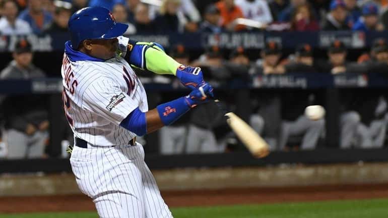 New York Mets leftfielder Yoenis Cespedes makes an out in...