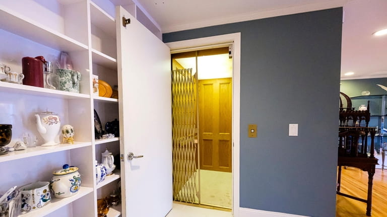 The elevator in a Locust Valley home on the market for...