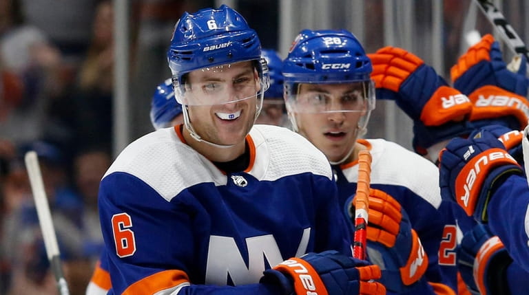 Ryan Pulock of the Islanders celebrates his second-period goal against the...
